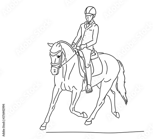 Fototapeta Naklejka Na Ścianę i Meble -  Young athlete riding a pony