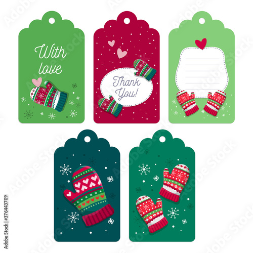 Set of five Christmas tags collection with mittens and snowflakes. Template for New Year greeting, winter holiday labels, decorations.
