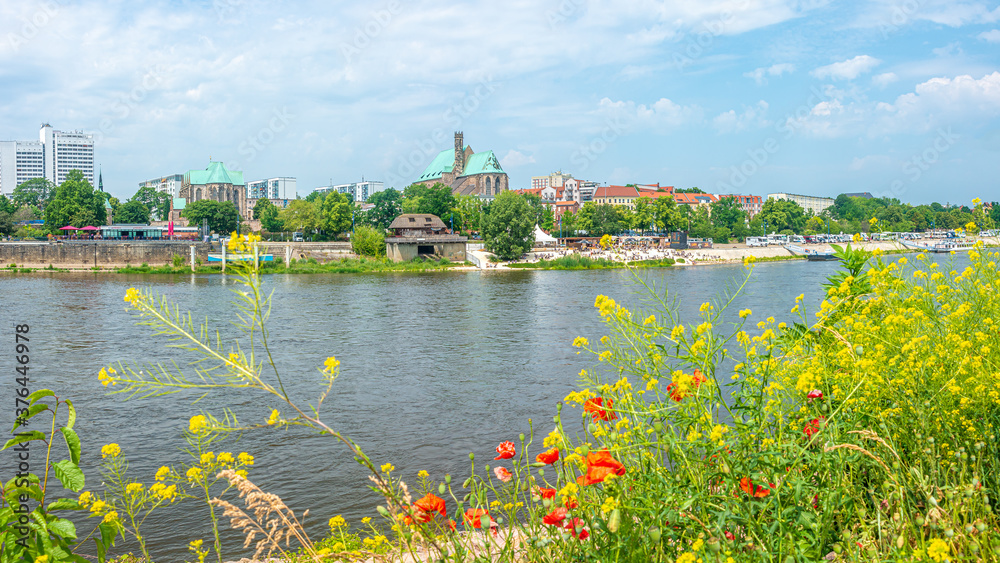 Panoramic view over beach cafes, restaurants and camping site for campers at the downtown near Elbe river in Magdeburg, Germany