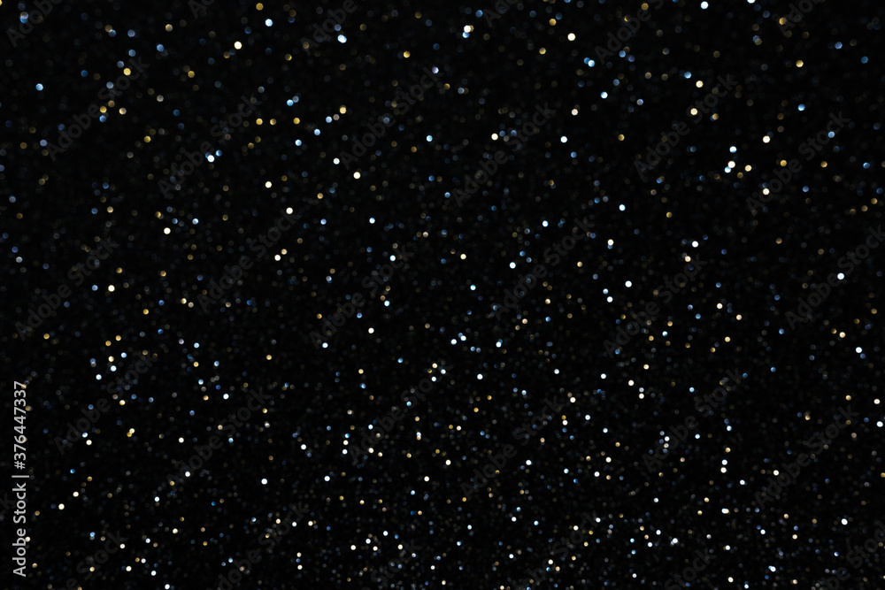 Obraz premium Dark abstract background with bokeh lights. Texture