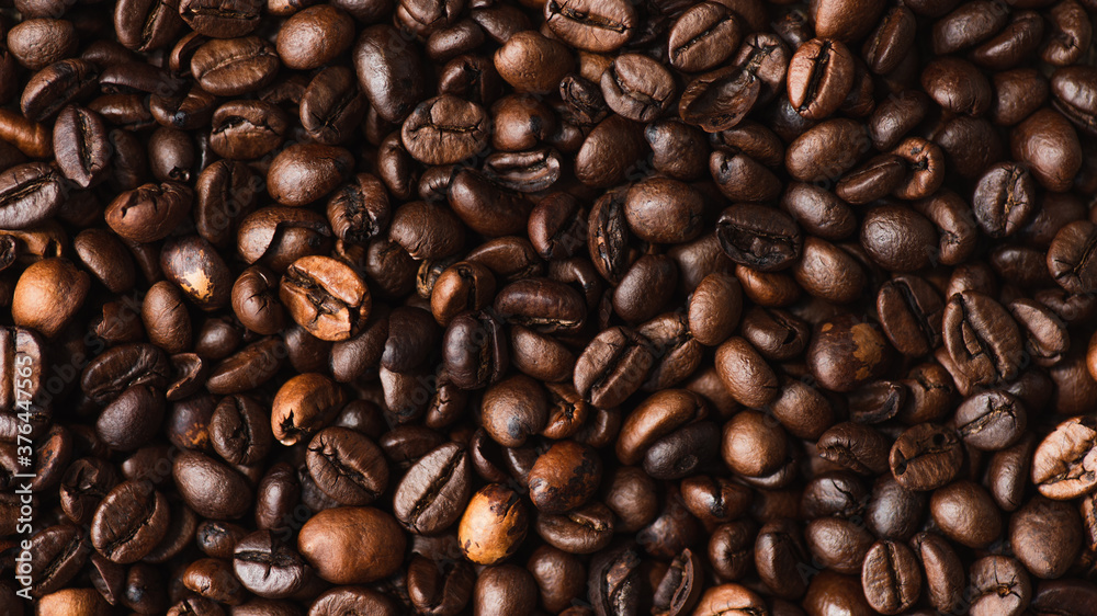 top view of fresh roasted coffee beans background top view of fresh roasted coffee beans background
