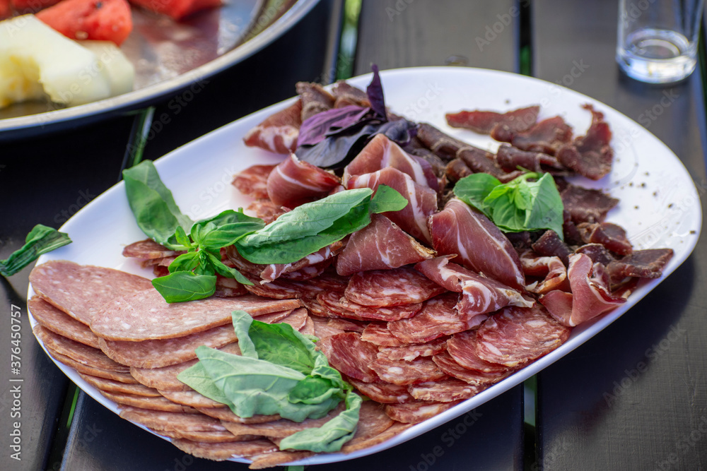 plate with cold cuts close up.