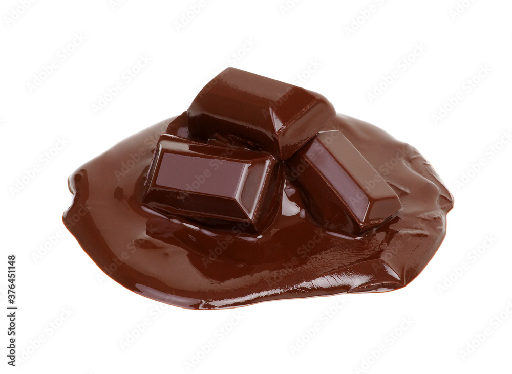 Melting piece of dark chocolate bar on white Melting piece of dark chocolate bar on white
