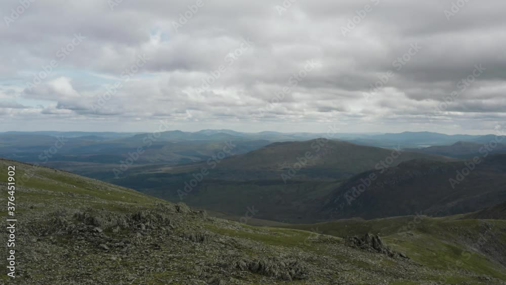High elevated scenic panoramic from Carnedd Llewelyn summit in Snowdonia Wales High elevated scenic panoramic from Carnedd Llewelyn summit in Snowdonia Wales