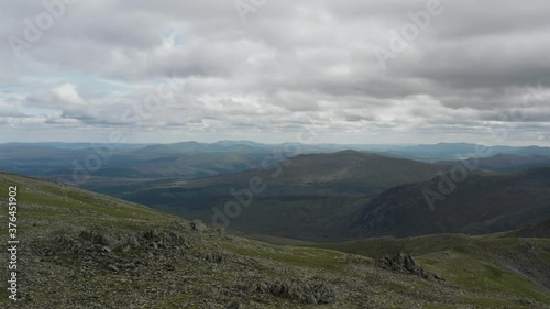 High elevated scenic panoramic from Carnedd Llewelyn summit in Snowdonia Wales photo