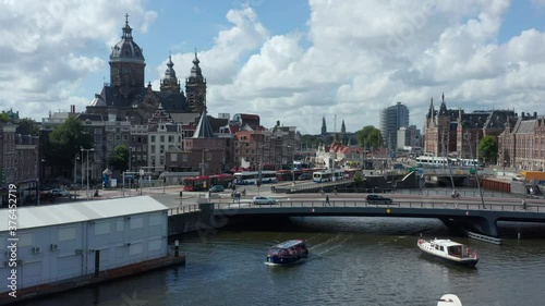 Towards Basilica of Saint Nicholas, Amsterdam over River with Boat, Aerial Drone photo