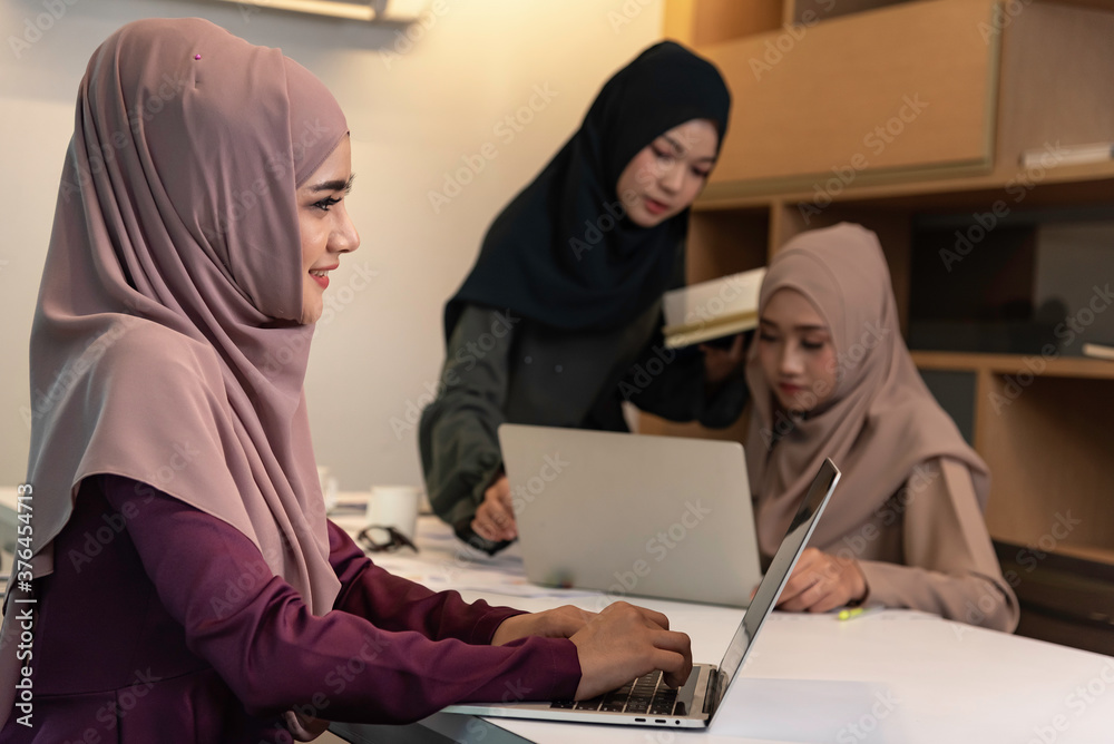 Asian muslim business woman work and meeting in office.