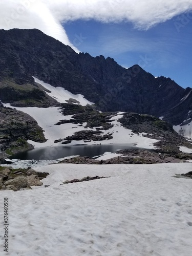 snow glaciers and lakes in Glacier National Park