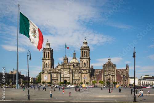 Mexican flag and cathedral on Mexico City's main square (zócalo) photo