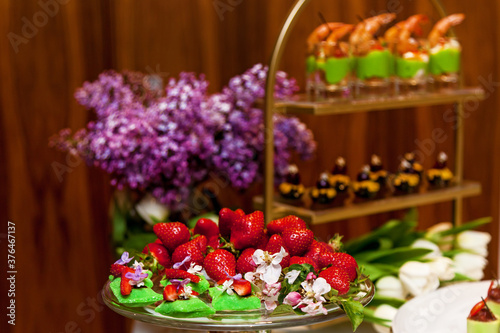 Catering  snacks with strawberries for a banquet