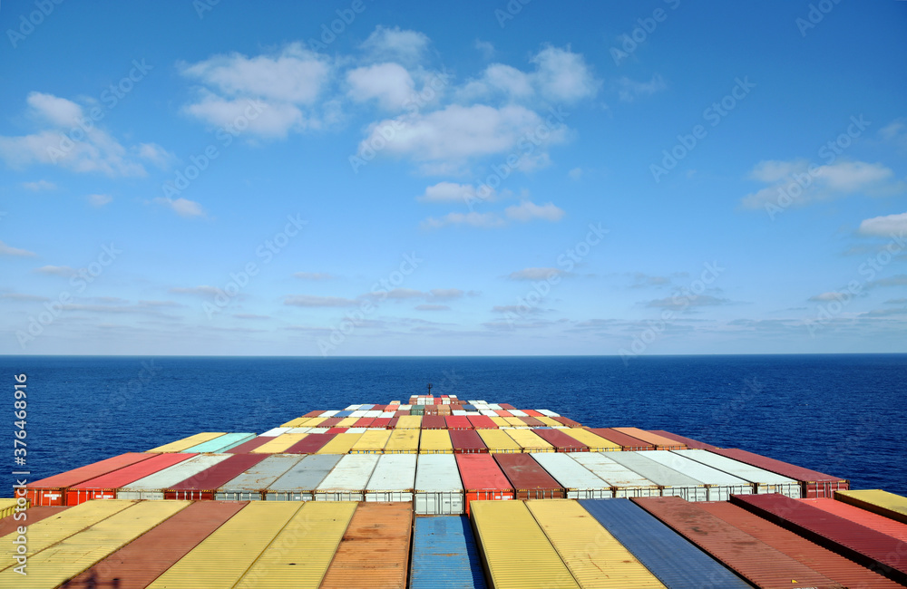 View on deck of container ship, during her passage through the ocean. 