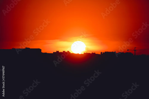 Sun touching the horizon during the sunset 