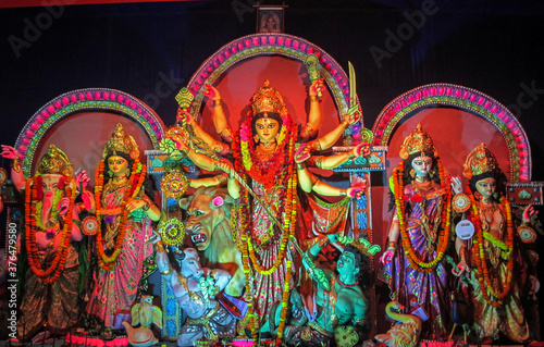 Durga Puja or Durgotsava is an annual Hindu festival celebrated mainly in West Bengal Indian.Durga is Goddess riding a lion with many arms each carrying weapon and defeating evil power of Mahishasura.