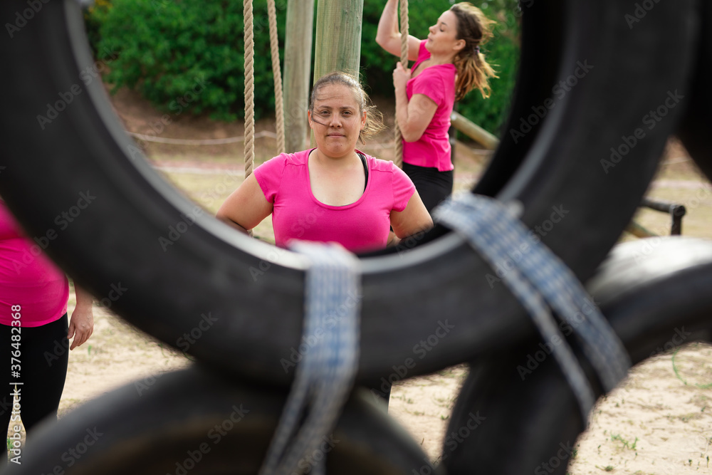 Portrait of woman standing at boot camp Portrait of woman standing at boot camp