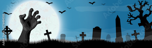 Halloween undead hand in front of full moon