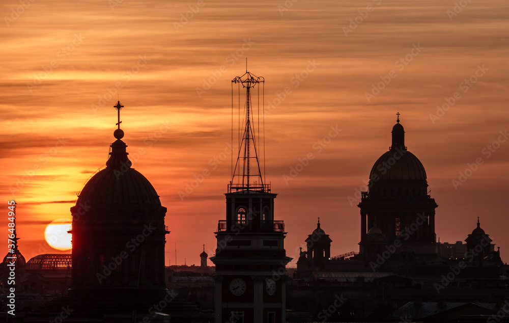 Telephoto sunset with Kazan and St Isaac cathedrals, City Duma Tower, Saint-Petersburg, Russia