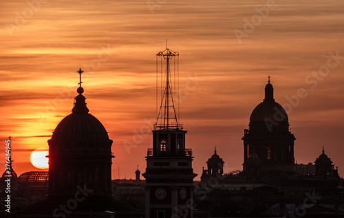 Telephoto sunset with Kazan and St Isaac cathedrals, City Duma Tower, Saint-Petersburg, Russia