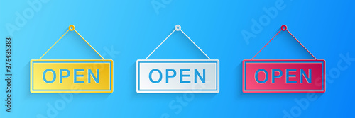 Paper cut Hanging sign with text Open door icon isolated on blue background. Paper art style. Vector.
