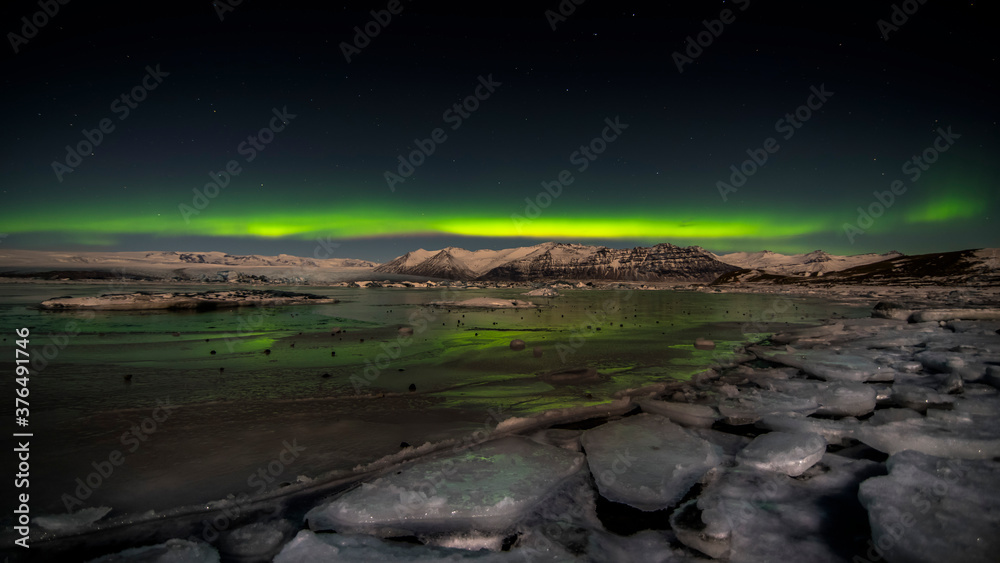northern lights in the sky over glacier lagoon 