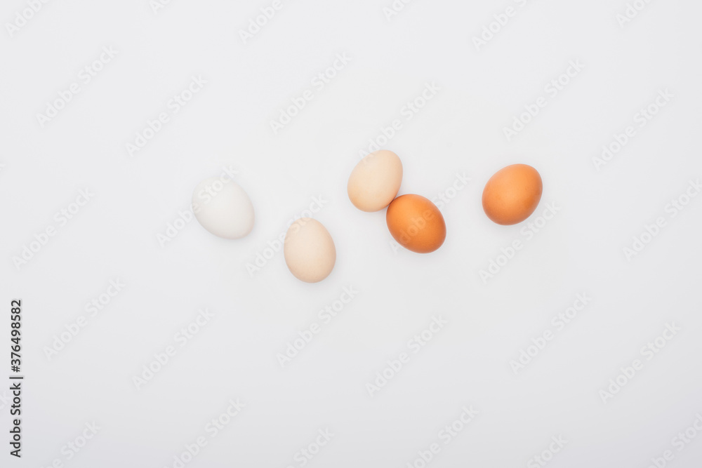 top view of fresh chicken eggs isolated on white top view of fresh chicken eggs isolated on white