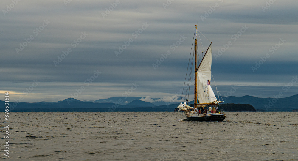 raising the sails on a historic schooner on Lake Champlain, Burlington, Vermont
