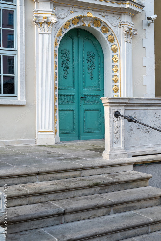 Fototapeta premium Building entrance with old stone stairs