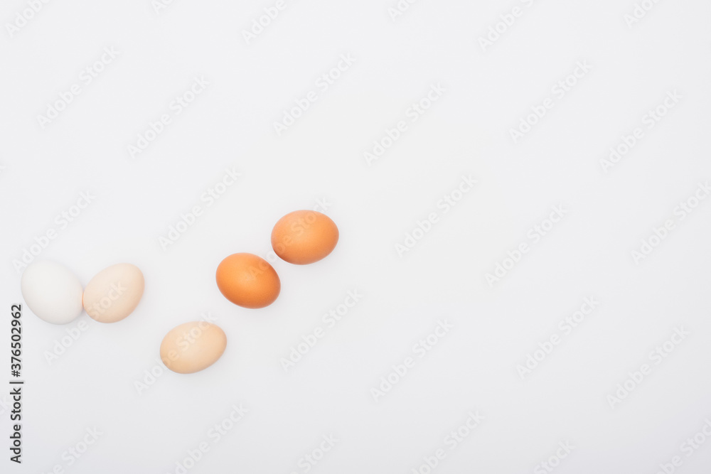 top view of fresh chicken eggs isolated on white top view of fresh chicken eggs isolated on white