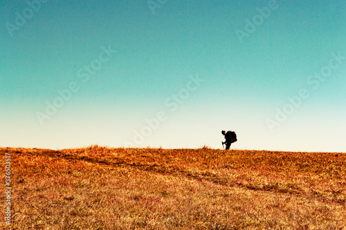 Hiker on a Bald Mountain in the Fall