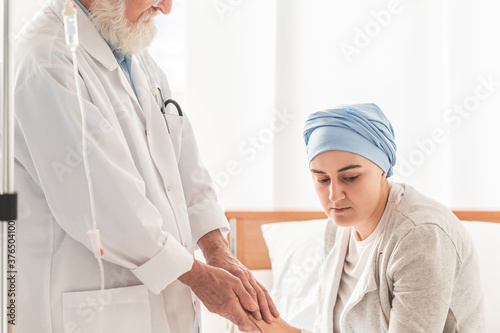 Doctor holding patient's hands