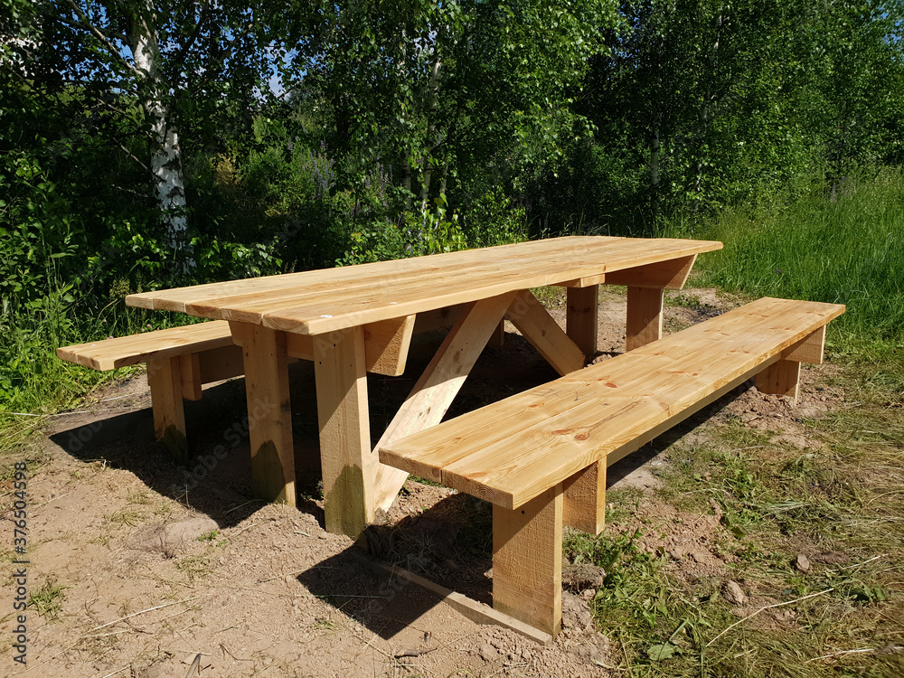 Wooden table and benches for outdoor recreation