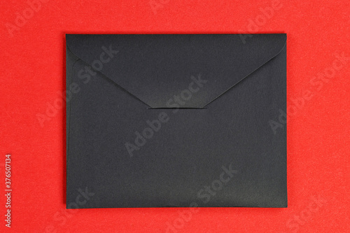 Black cardboard envelope is...