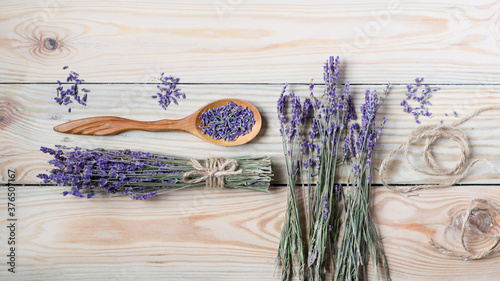 Bunch of dried lavender on wooden background. Top view.