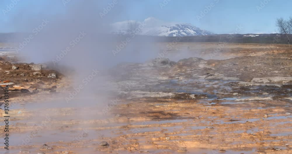 Steaming ground from geothermal heat in Geysir Iceland