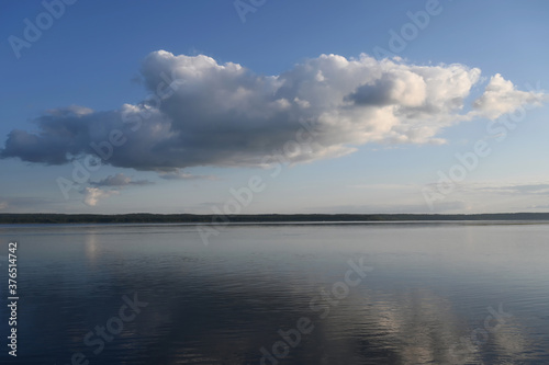 Blue sky with clouds over the lake.