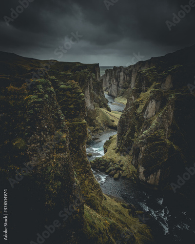 Unique landscape of Fjadrargljufur in Iceland. Top tourism destination. Fjadrargljufur Canyon is a massive canyon about 100 meters deep and about 2 kilometers long  located in South East of Iceland..