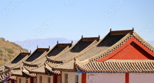 The layers of the roofs of small stores near the entrance to Mati Temple Grottoes, Zhangye, Gansu province, China.