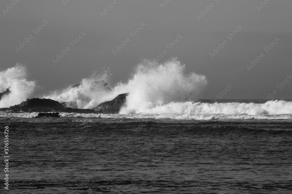 Surf breaking on a rocky shore