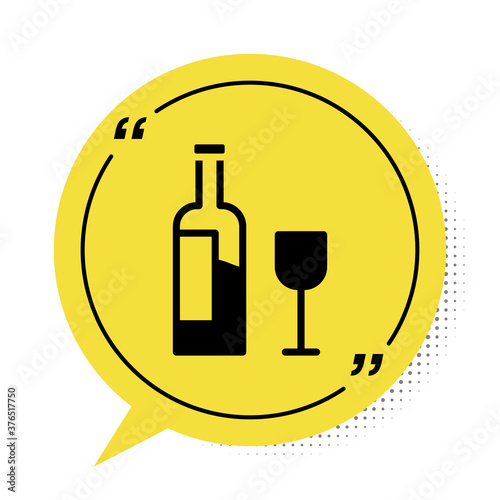 Black Wine bottle with glass icon isolated on white background. Yellow speech bubble symbol. Vector.