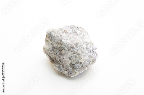 studio photo of white mica granite