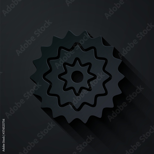 Paper cut Bicycle cassette mountain bike icon isolated on black background. Rear Bicycle Sprocket. Chainring crankset with chain. Paper art style. Vector.