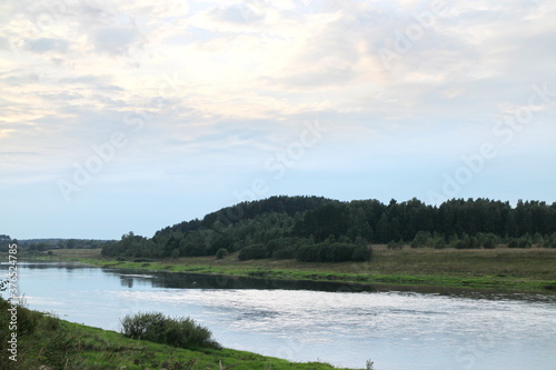 View of the river in the countryside at sunset