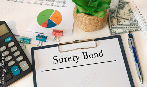 Concept image for blog headline or header image. Surety Bond inscription on paper.