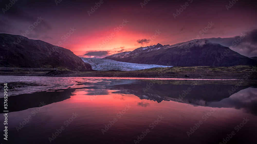 sunrise over the glacial lake
