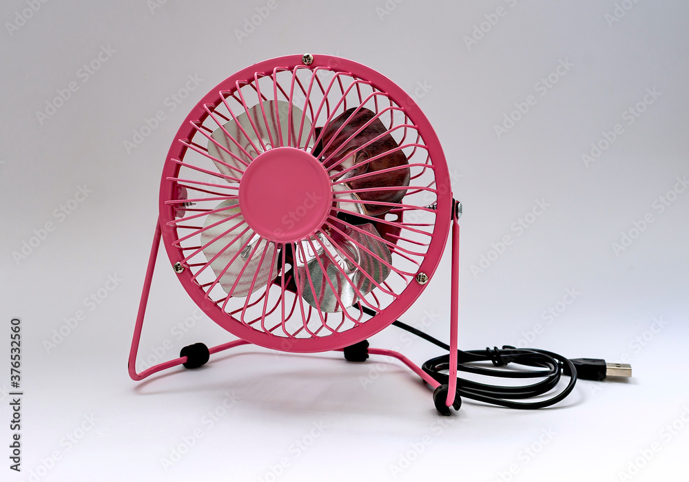Pink mini fan for desk table.