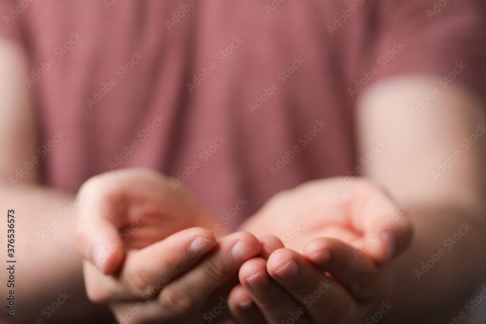 A man holding empty his hand A man holding empty his hand