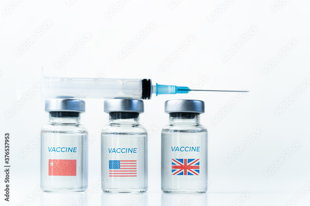 Transparent vials with USA, UK, China flag. Vaccine, syringe for covid-19 coronavirus, flu,infectious diseases. Injection after clinical trials for vaccination of human, people.Medicine, drug concept Transparent vials with USA, UK, China flag. Vaccine, syringe for covid-19 coronavirus, flu,infectious diseases. Injection after clinical trials for vaccination of human, people.Medicine, drug concept