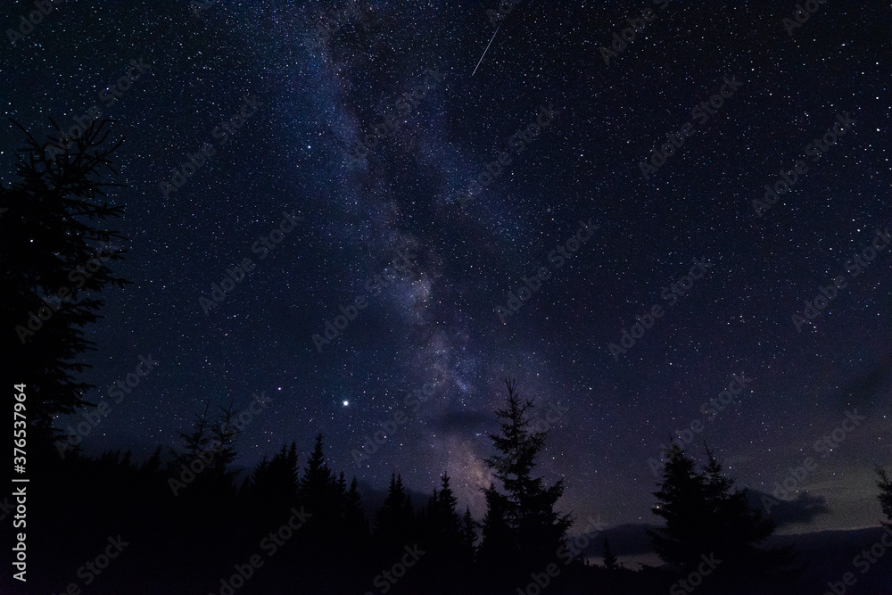 Perseid meteor shower and the Milky Way in the Carpathian mountains