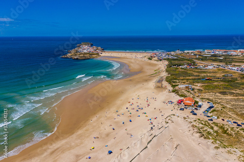 Campismo beach and Dunas beach and Island Baleal near Peniche on the shore of the Atlantic ocean in west coast of Portugal. Beautiful Baleal beach at Baleal peninsula close to Peniche, Portugal. photo