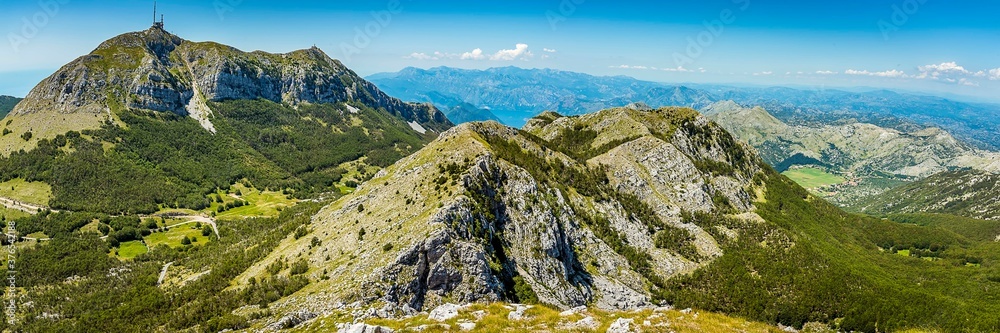 Panoramic View from Mount  Jezerski vrh near the town of Cetinje Montenegro towards the highest peak in the Lovcen mountains, Mount Štirovnik and the bay of Kotor in the distance