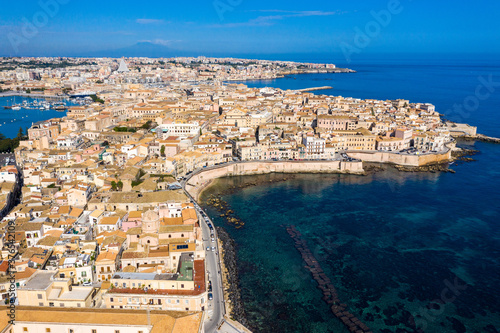 Siracusa  Ortigia Island from the air  Sicily  Italy. Isola di Ortigia  coast of Ortigia island at city of Syracuse  Sicily  Italy. Coastline town Syracuse  Sicily and old Ortigia island. Aerial view.